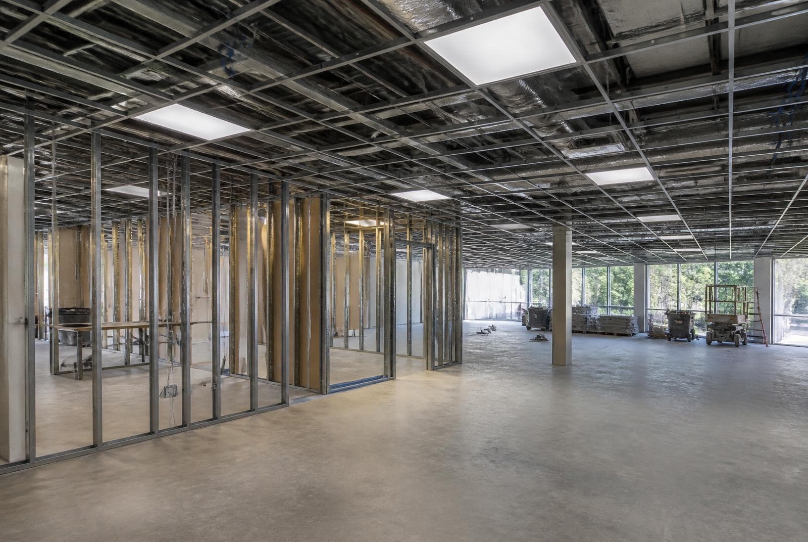 Tenant improvement in progress: metal stud framing across an open office floor